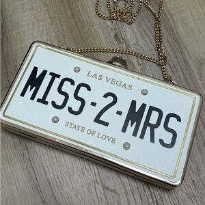 Aldo Las Vegas Miss 2 Mrs license plate clutch